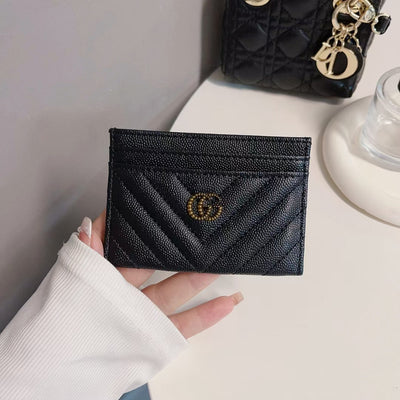 Close-up of GG monogram pattern on Classic GG Wallet