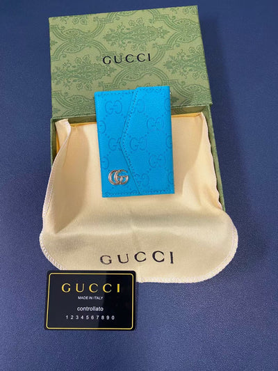 Stylish Gucci wallet in classic black leather with subtle branding