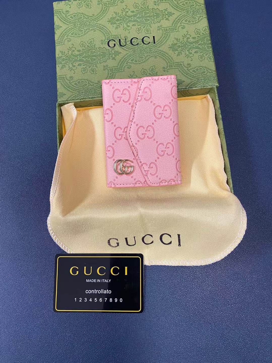 Gucci wallet with organized interior, featuring slots for cards and cash