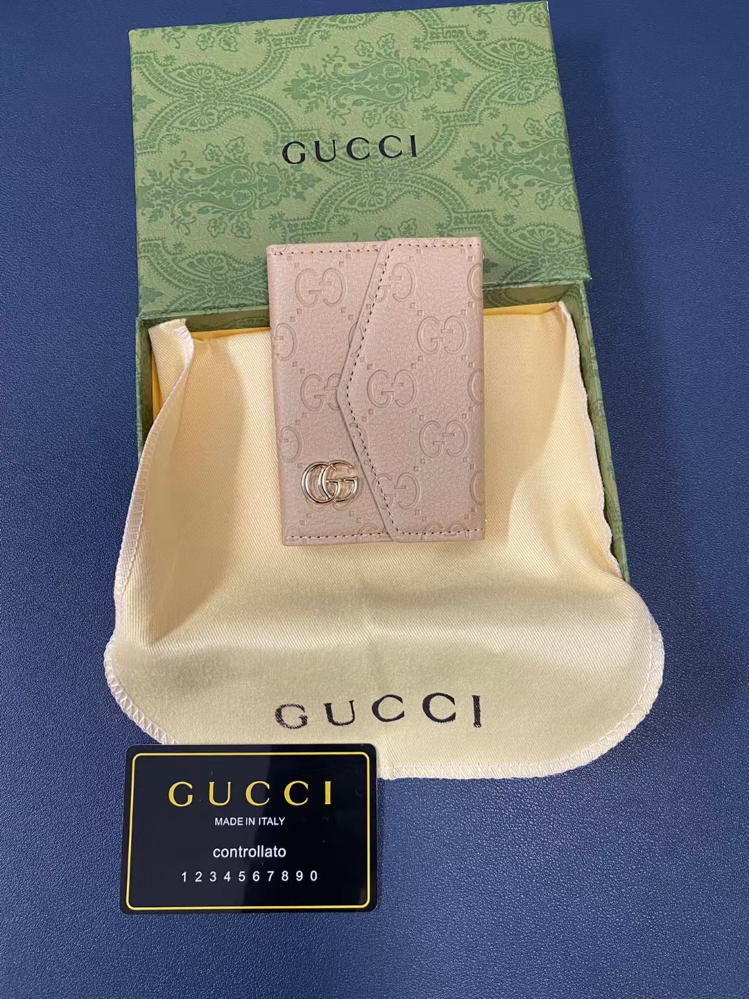 High-end Gucci wallet displayed with its luxurious leather and refined stitching
