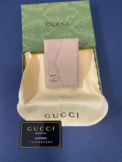 High-end Gucci wallet displayed with its luxurious leather and refined stitching