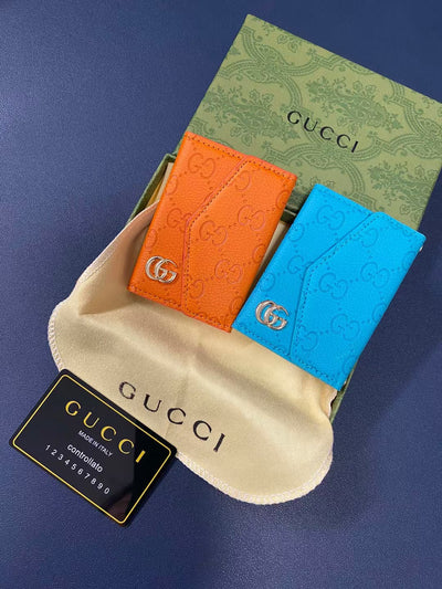 Chic Gucci wallet with sleek silhouette and embossed logo detail