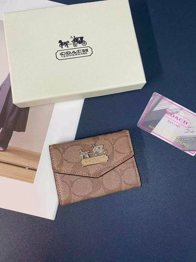 Elegant Coach Wallet and Card Holder Duo with premium leather texture