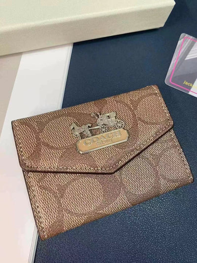 Side view of Coach Wallet and Card Holder Duo showing detailed stitching and design