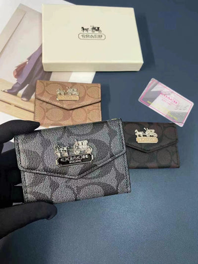 Interior view of the Coach Wallet showing card slots and cash compartments