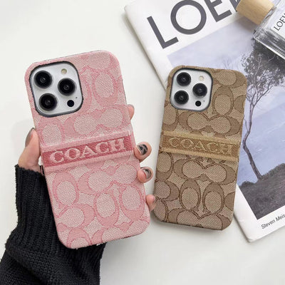 Close-up of Coach logo on elegant iPhone Case