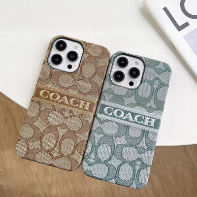 iPhone with Coach Ladies' Case showing perfect fit