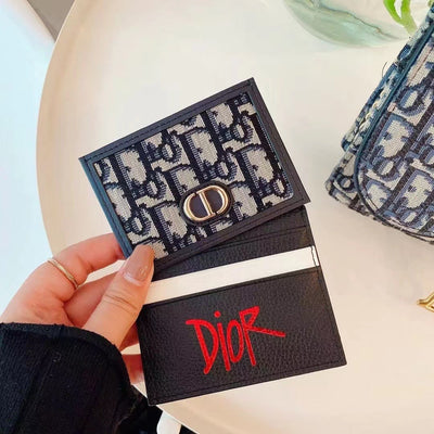 Close-up of Dior Slim Mini Wallet Card Holder with Iconic Logo