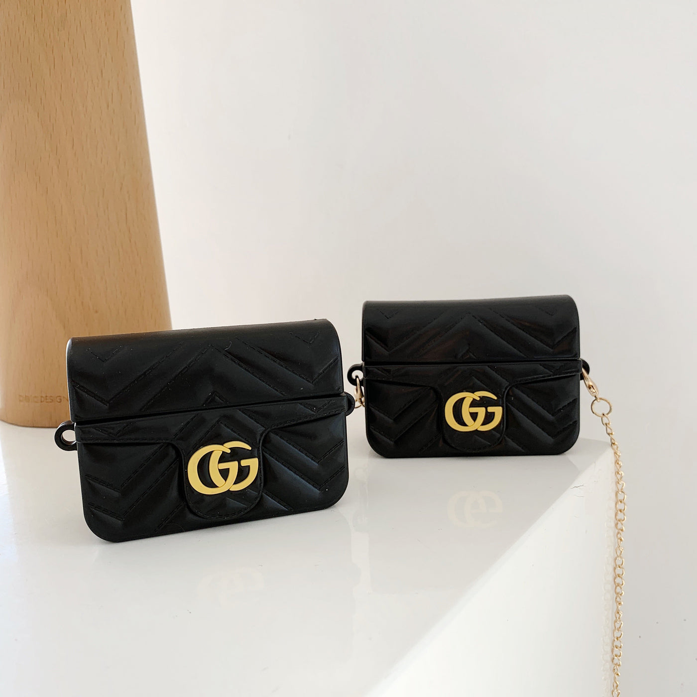 GUCCI luxury AirPods case in iconic design