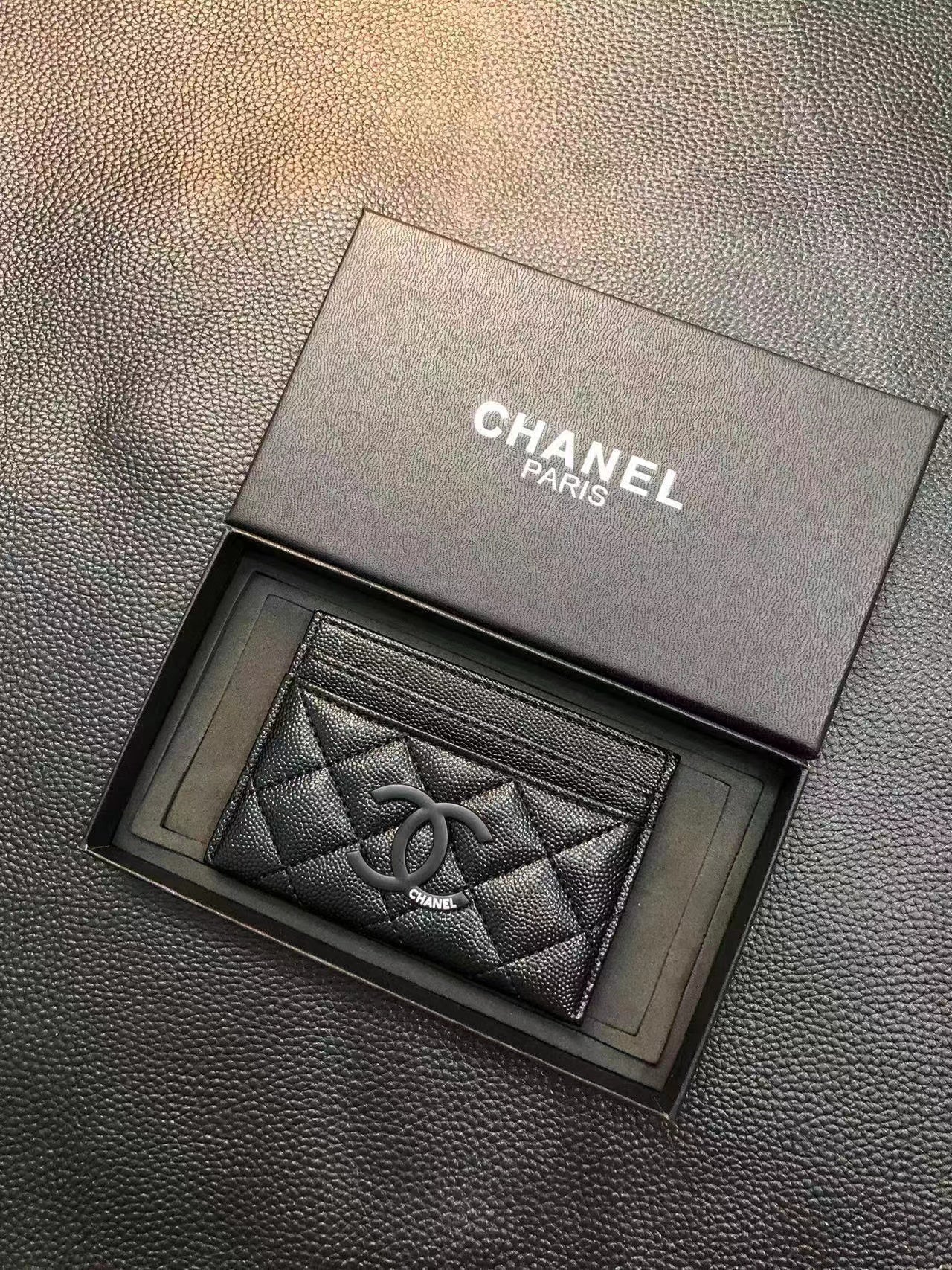 Elegant Chanel card holder with timeless design
