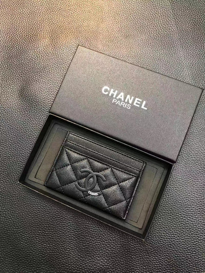 Elegant Chanel card holder with timeless design