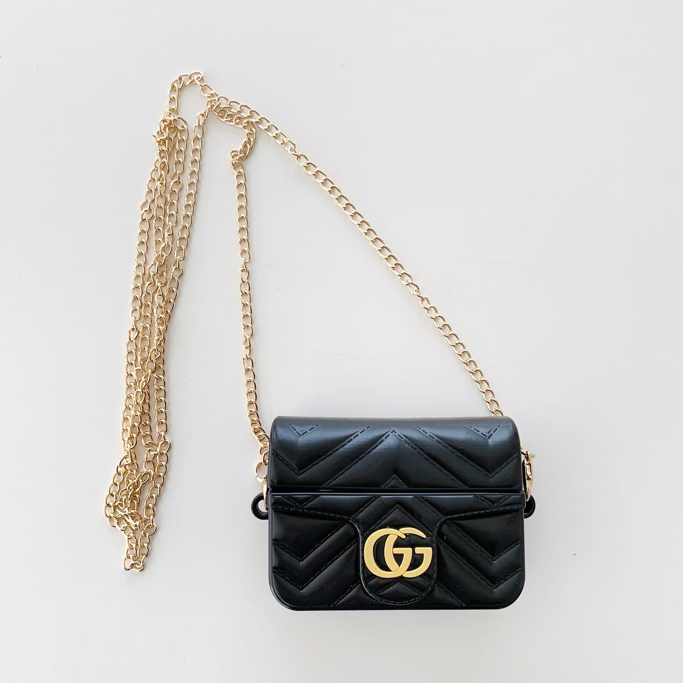 Chic GUCCI AirPods case featuring signature style