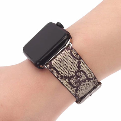 Close-up of Gucci GG Monogram Pattern on Apple Watch Strap
