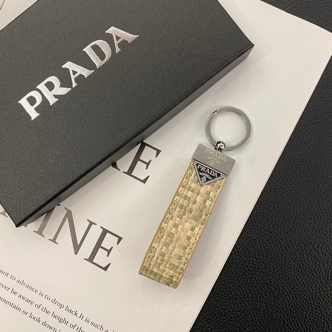 Luxury Fashion Accessory - Prada Lady Keychain in Sophisticated Design