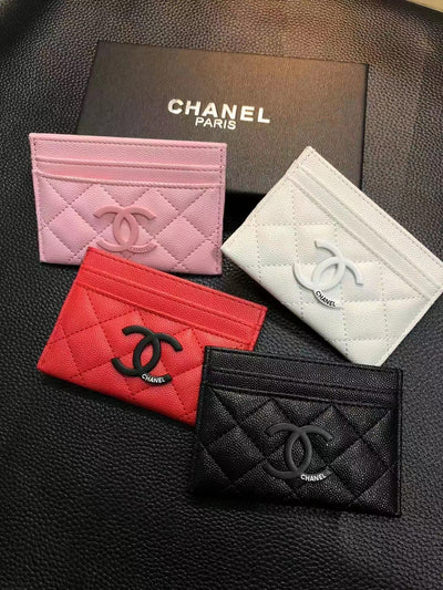 Iconic Chanel card holder featuring classic quilted pattern